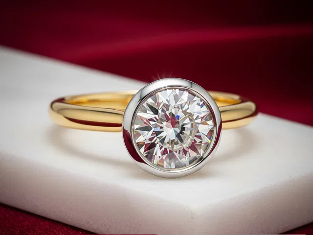 /Yellow Gold and Platinum Bezel Set Diamond Solitaire